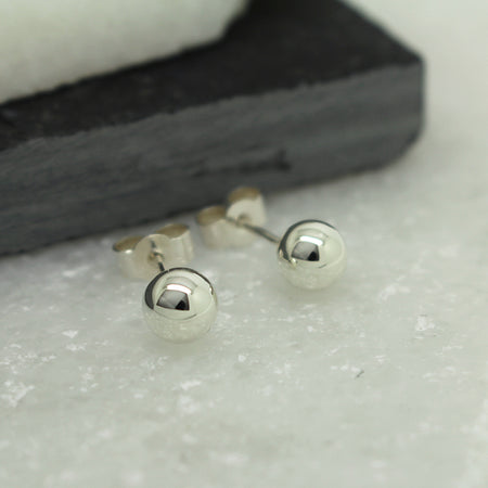 silver-splash-stud-earrings-by-julie-nicaisse-jewellery-designer-london